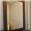 DM08. Beveled wall mirror with wood frame. 